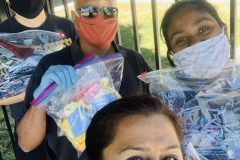 Harbir Bhatia with Suds Jain, Kevin Park and youth volunteer donating masks