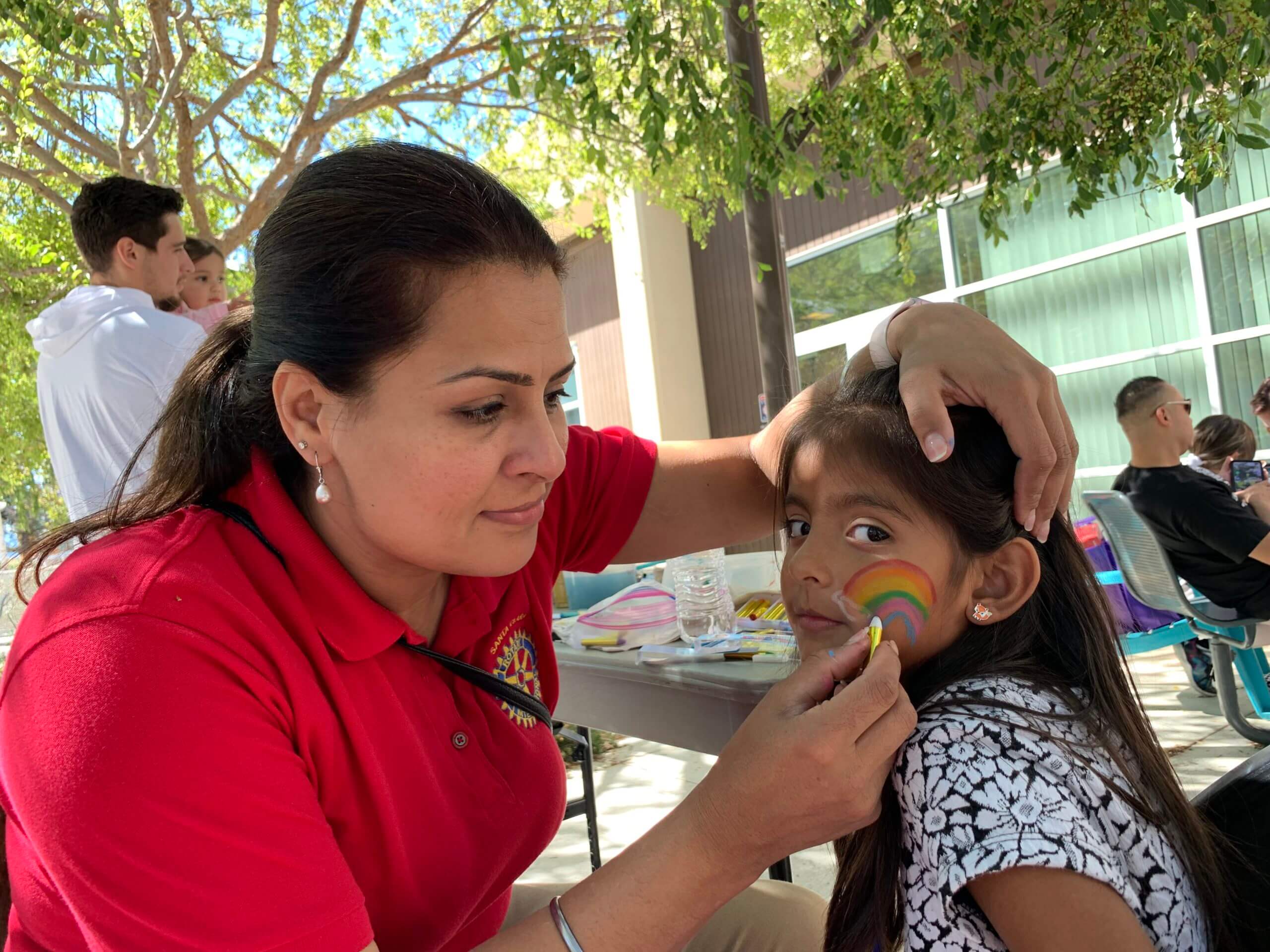 Harbir volunteering at a community event